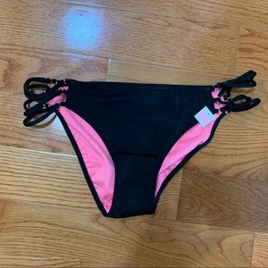 NWT Victoria’s Secret swim bottoms. Medium